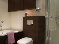 Aranżacje małych łazienek narożna kabina prysznicowa